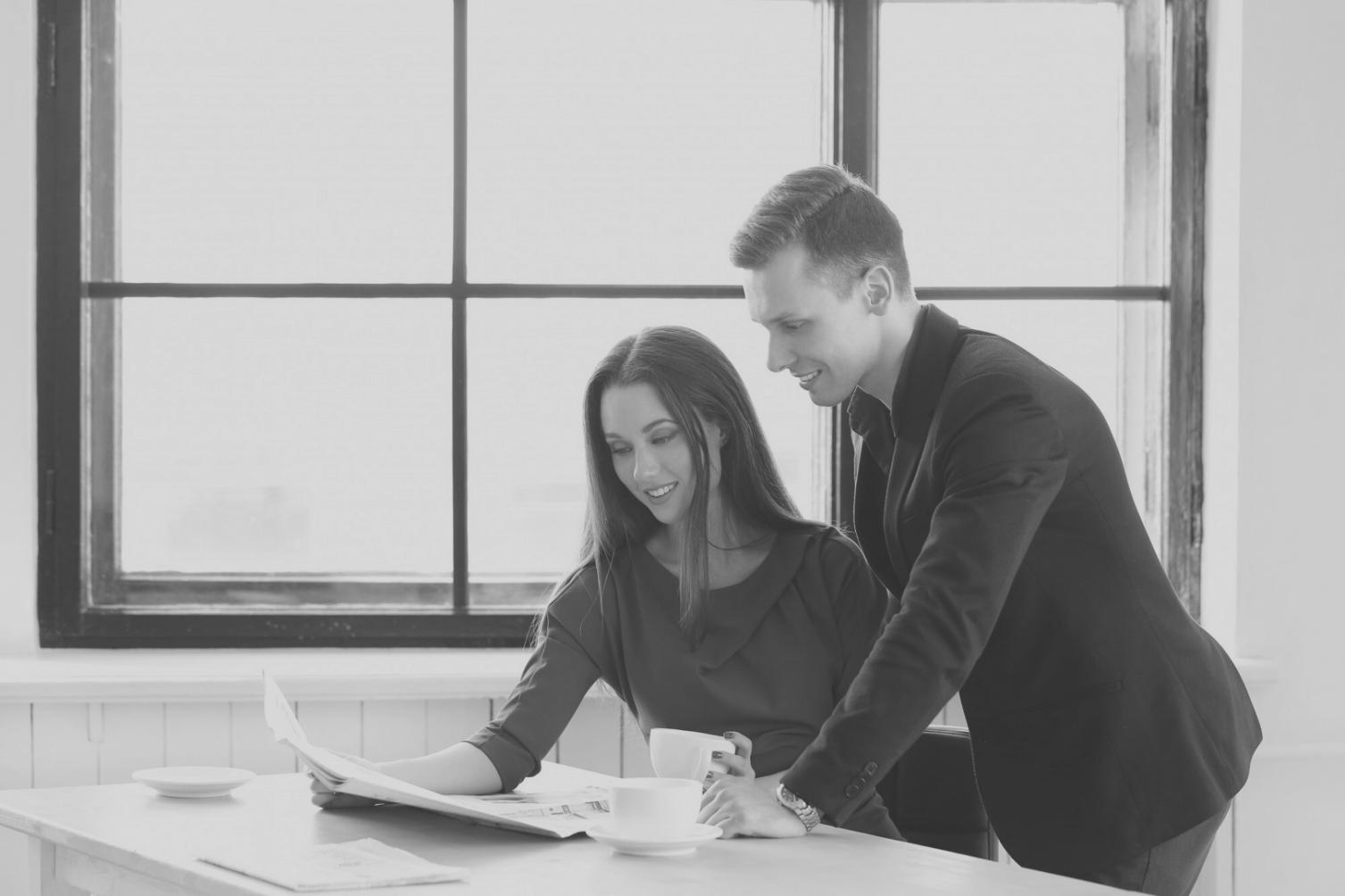 Investment professional analyzing quarterly earnings reports and financial performance metrics