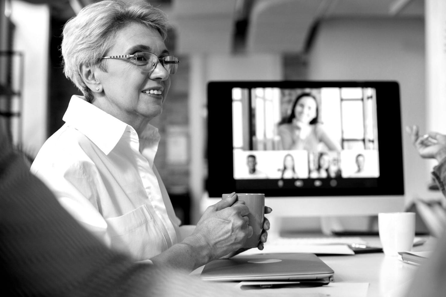 Financial team analyzing market data and investment portfolios in modern office environment